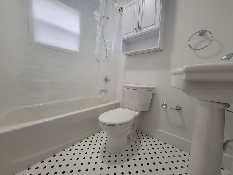Super clean and modern bathroom! - 909 8th St