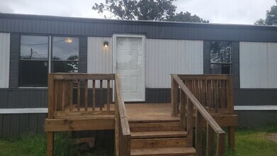 Building Photo - " 2-Bed, 2-Bath Mobile Home Retreat in Tan...