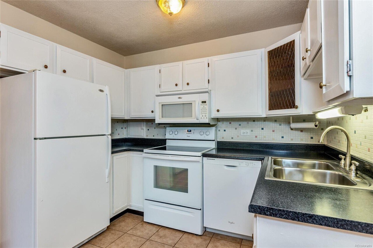 Building Photo - 9340 E Center Ave