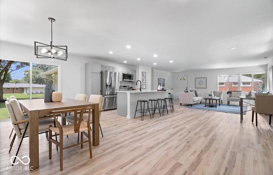 Large open combined kitchen and living room. - 6326 Forest View Dr