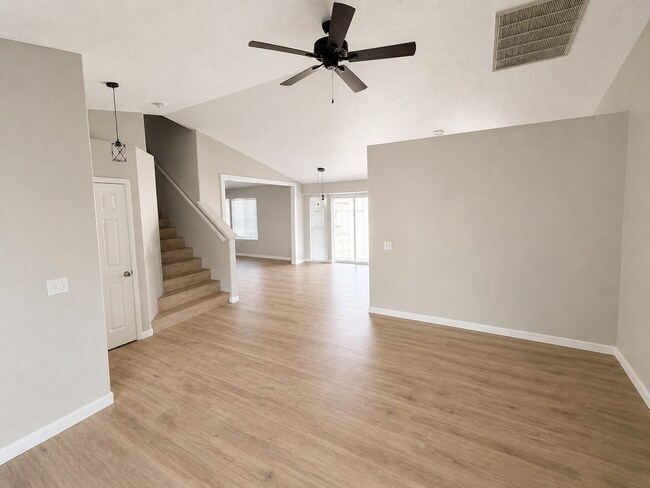 Building Photo - Spacious Home with 3-Car Garage, Two Living Areas & Covered Patio