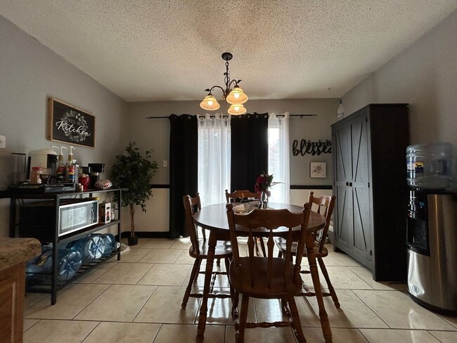 Building Photo - Introducing this fantastic townhome in the...