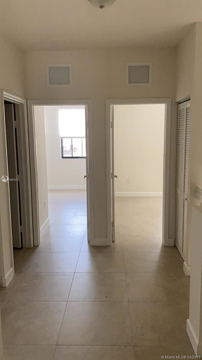 Building Photo - 6175 NW 104th Ct