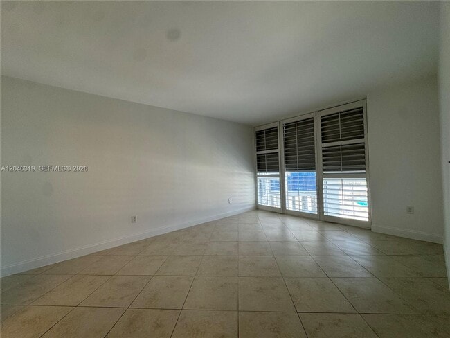 Building Photo - 10275 Collins Ave