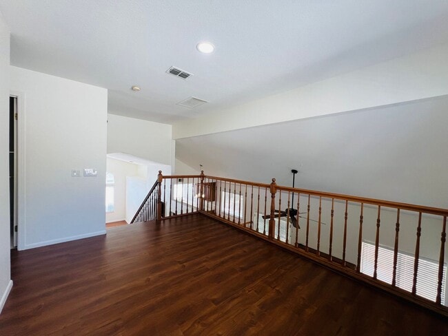 Building Photo - Spacious and Sparkling with New Paint 3 be...
