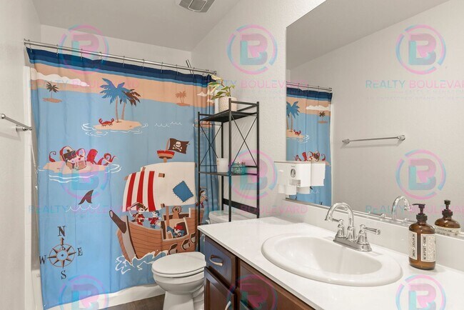 Building Photo - Spacious 4-Bedroom Lemon Valley Home with ...