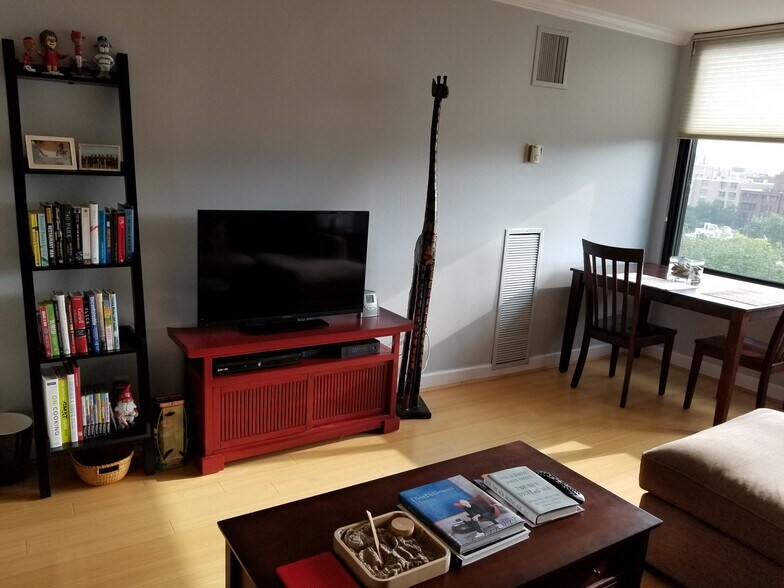 Spacious Living Room with West Facing Views - 1301 20th St NW
