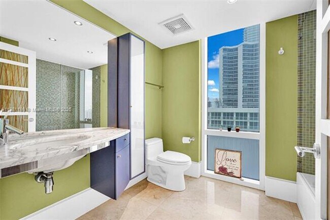 Building Photo - 16699 Collins Ave