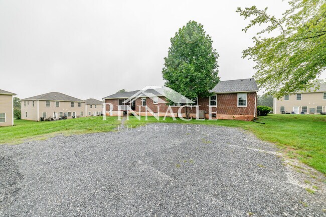 Back of Home/ Driveway - 126 Tomahawk Industrial Park