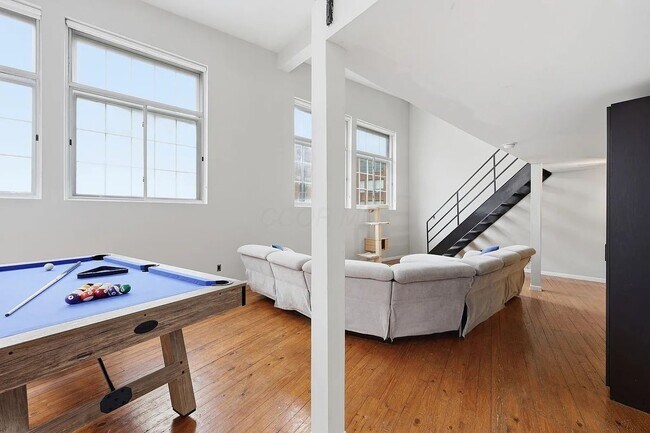 Building Photo - Industrial NYC-Style Loft | Battleship Building | 3 Parking Spots Included