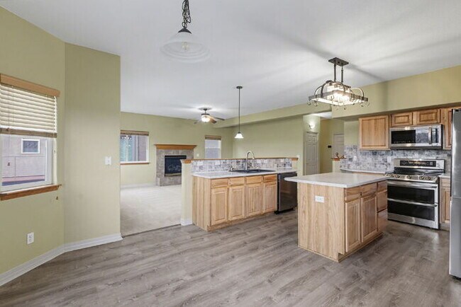 Building Photo - Spacious 5-Bedroom Home Backing to Open Space with Mountain Views