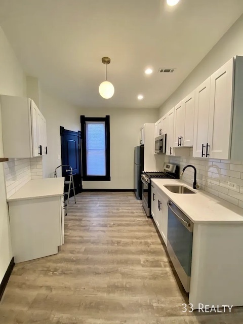 Building Photo - Beautifully Rehabbed 2 Bedroom 1.5 Bath in...