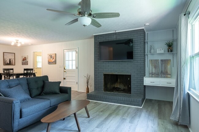 Building Photo - Classic brick rancher with carport and updated decor