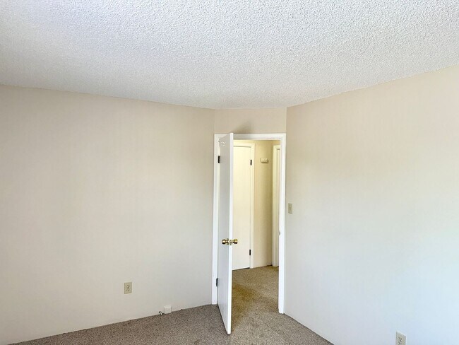 Building Photo - Updated Two Bed Townhome Nestled in the He...