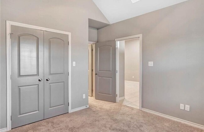 Building Photo - College Station - 3 bedroom / 3 bath Townhome, covered patio & back yard with one car garage.