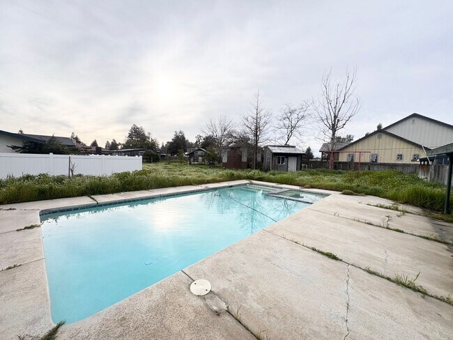 Building Photo - Available Now - Beautiful Ranch-Style Home with Pool