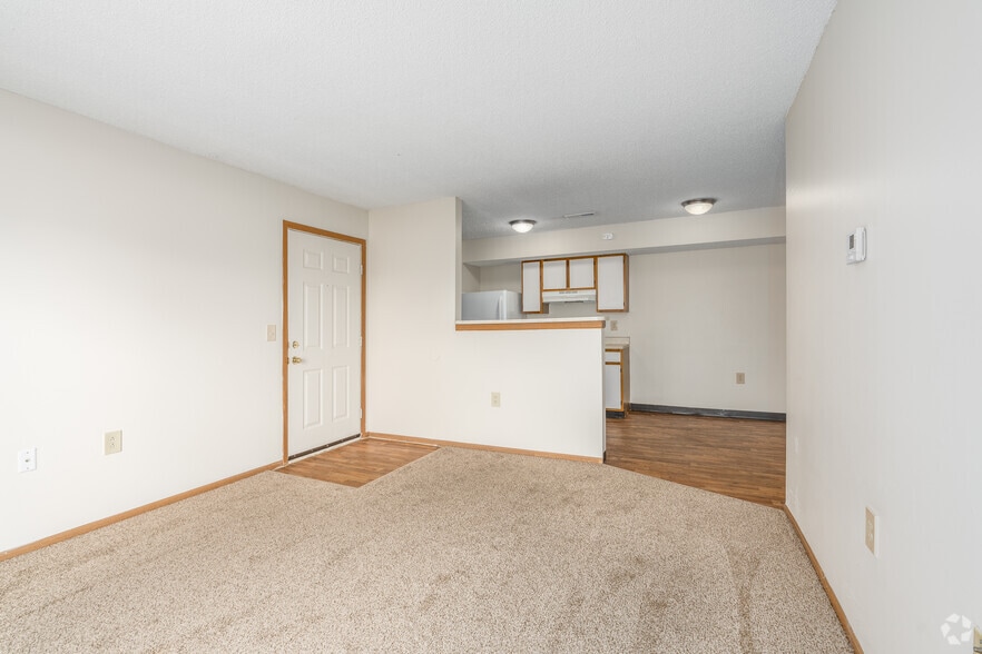Main living area and kitchen of a River Valley apartment home in Lancaster, OH. - River Valley