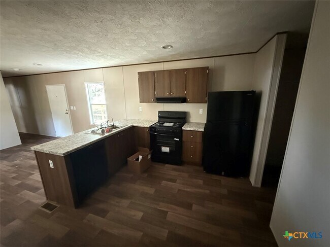Building Photo - 307 Quail Run St