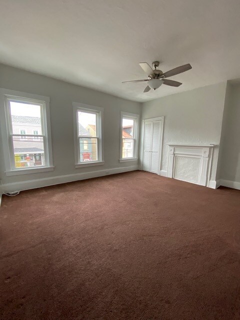 Large bright bedroom with high ceilings and new windows - 5234 Holmes St