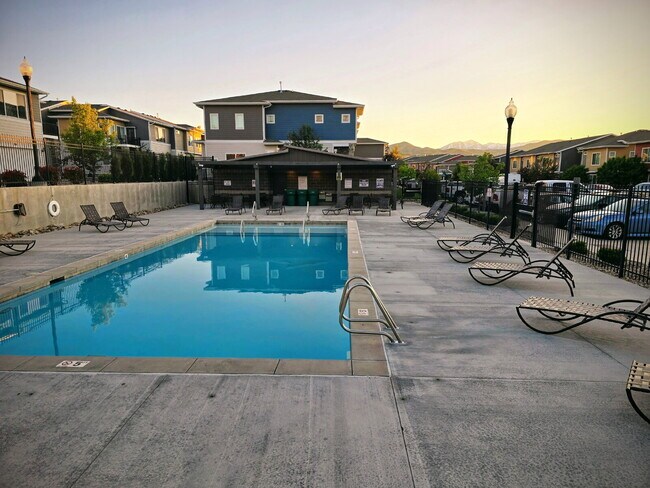 Building Photo - "Chic 3-Bed Townhouse with Pool Access in Bluffdale!"