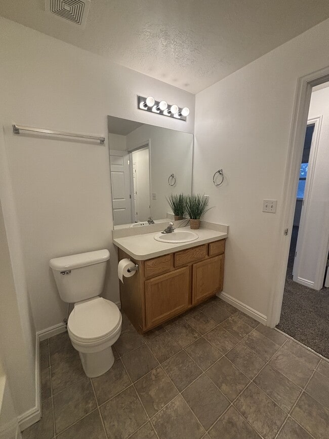 Building Photo - 8083 N Ridge Loop E