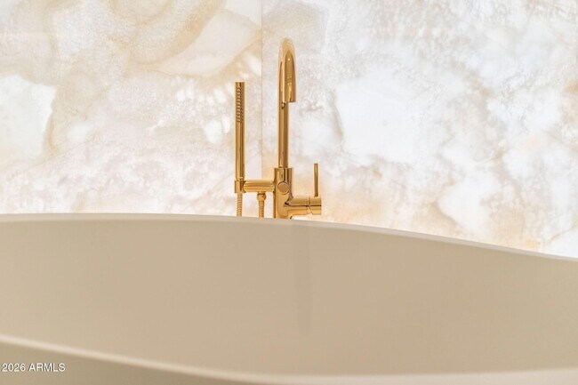 Building Photo - 6587 N Palmeraie Blvd