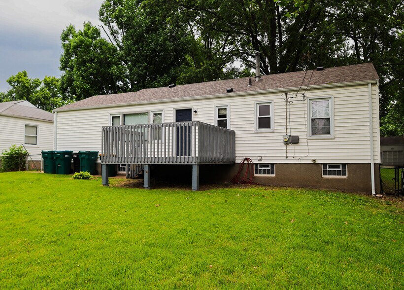 Back yard and deck. - 1116 Bliss Dr