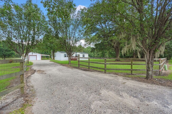 Building Photo - beautifully refreshed 3-bedroom, 2-bath home offering peaceful country living with modern updates!