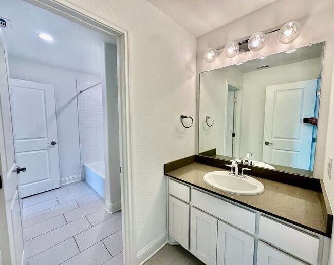 Building Photo - Stunning 4BR/3.5BA Modern Home in Walsh — Available 7/21