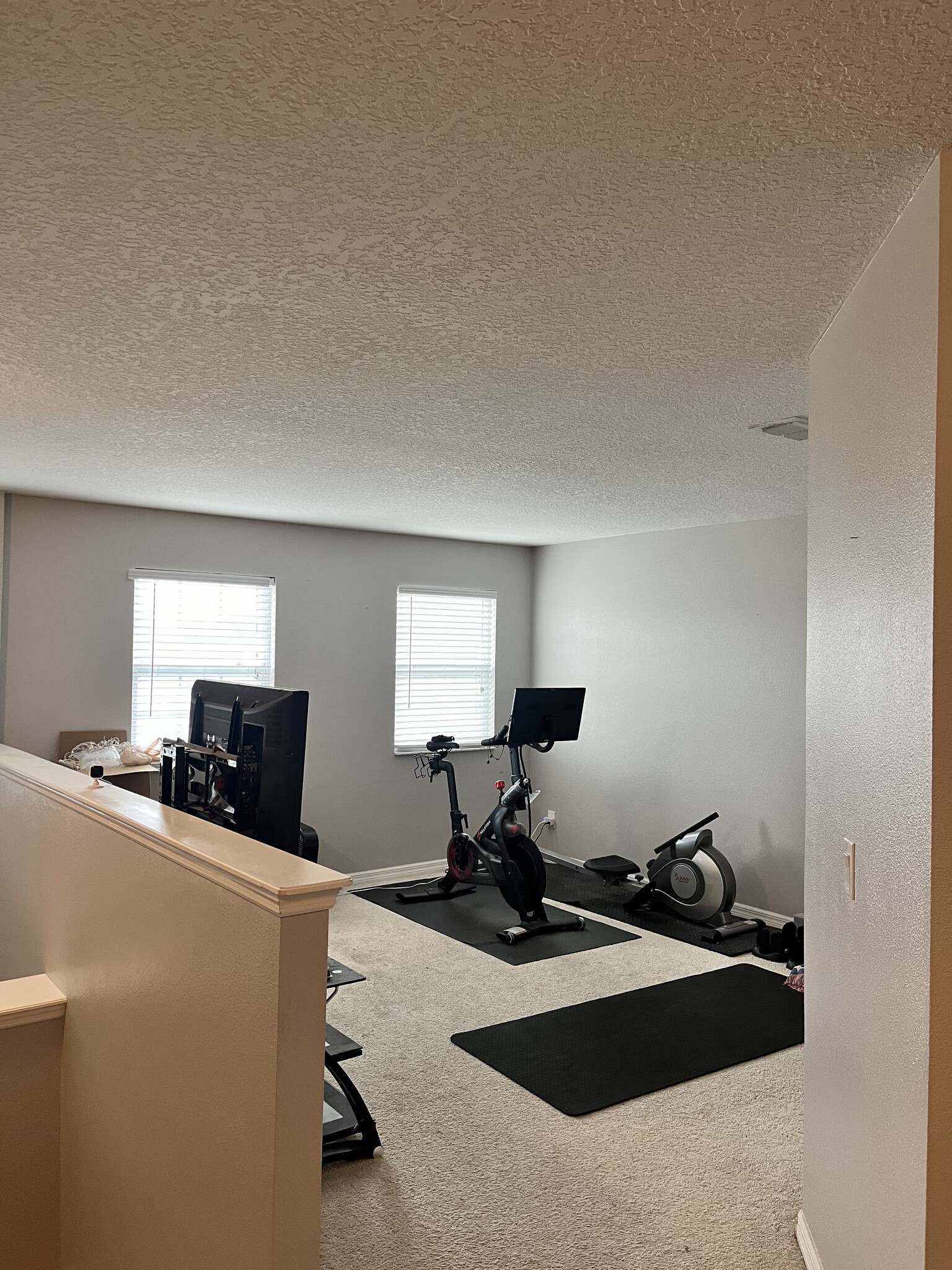 Landing upstairs, perfect as a workout room or playroom - 192 Whispering Pines Way