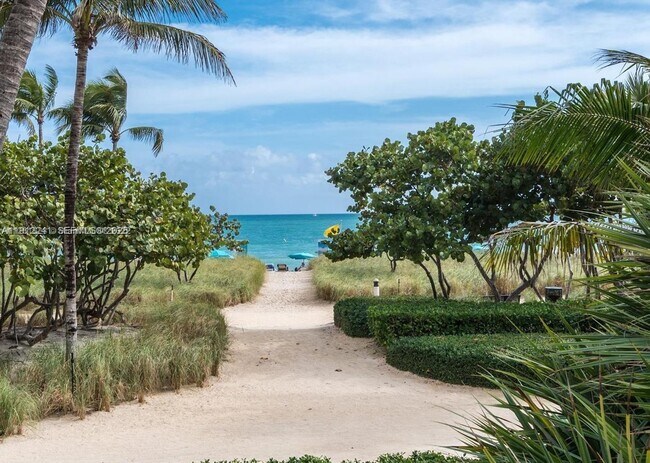 Building Photo - 10185 Collins Ave