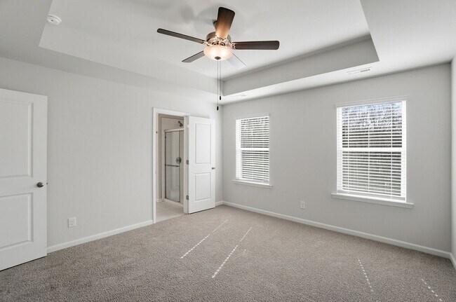 Building Photo - 4BR Home in The Pines at Paw Creek – New Construction + Private Deck