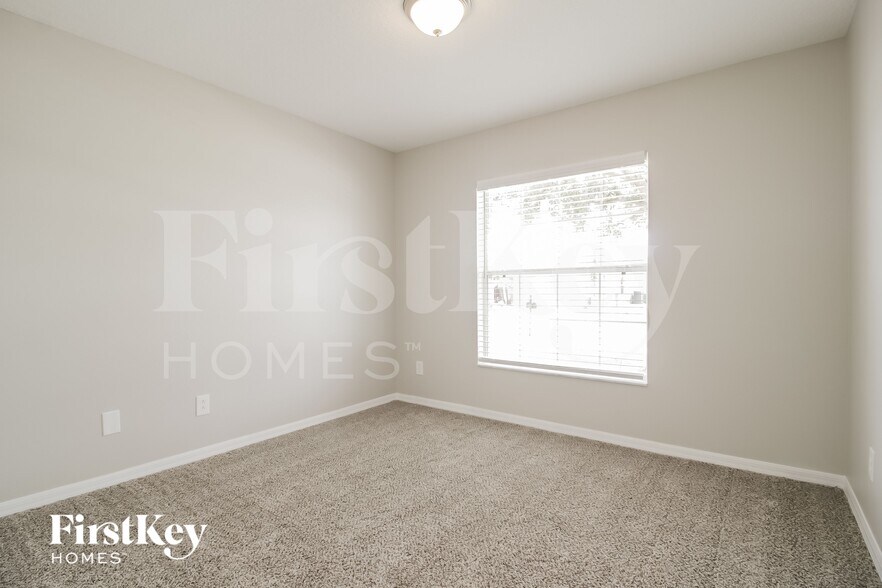 Building Photo - 5771 Cinnamon Fern Blvd