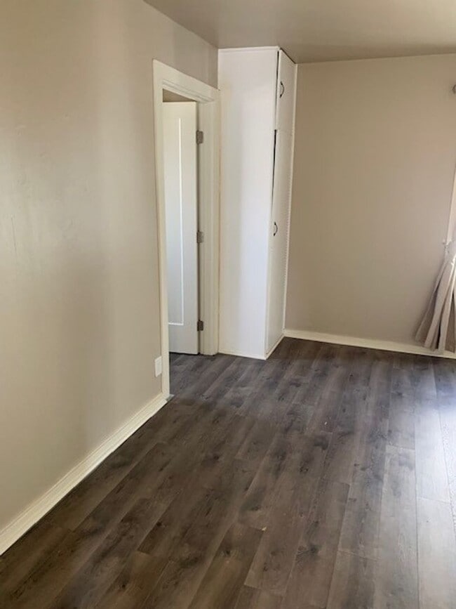 Building Photo - Charming 1-Bedroom Oasis with Modern Upgrades & Spacious Yard!