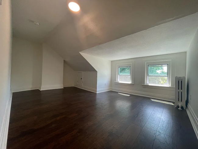 3rd floor front bedroom from doorway - 5859 Nicholson St