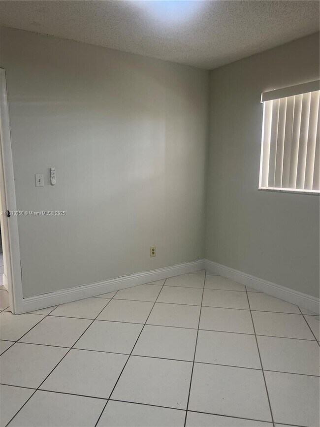 Building Photo - 6091 NW 61st Ave