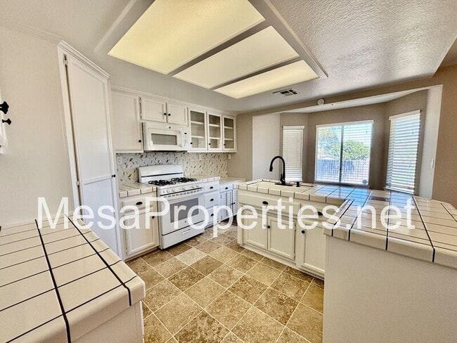 Building Photo - 7891 Corona Ave