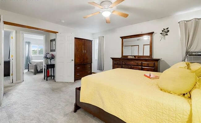 Building Photo - Spacious 5-Bedroom Home with Bonus Entertainment Room & Low-Maintenance Yard