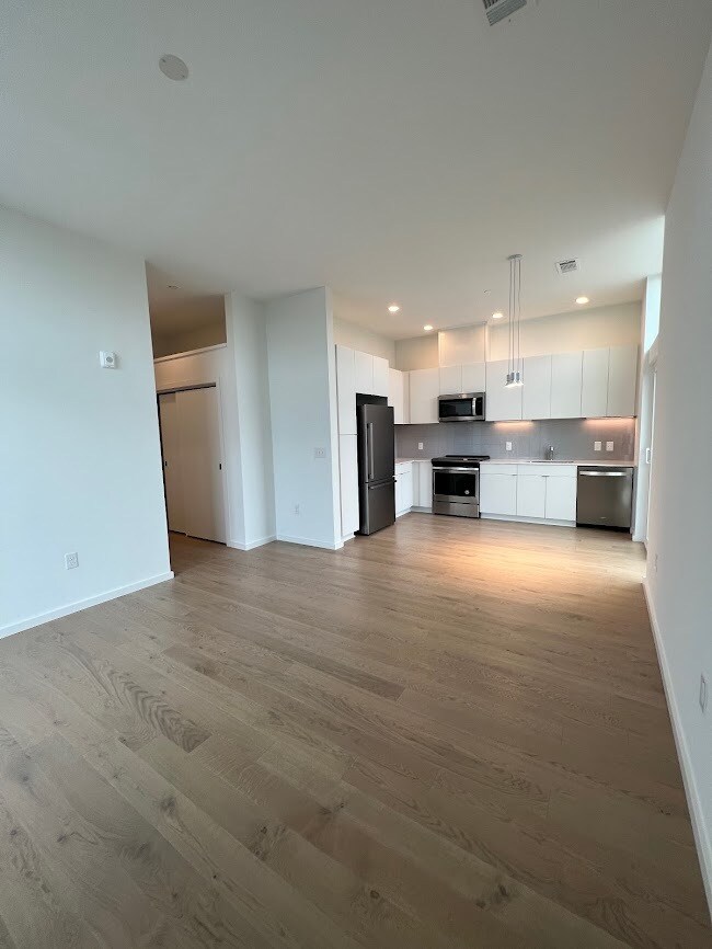Living room and kitchen area - 600 S Duke St