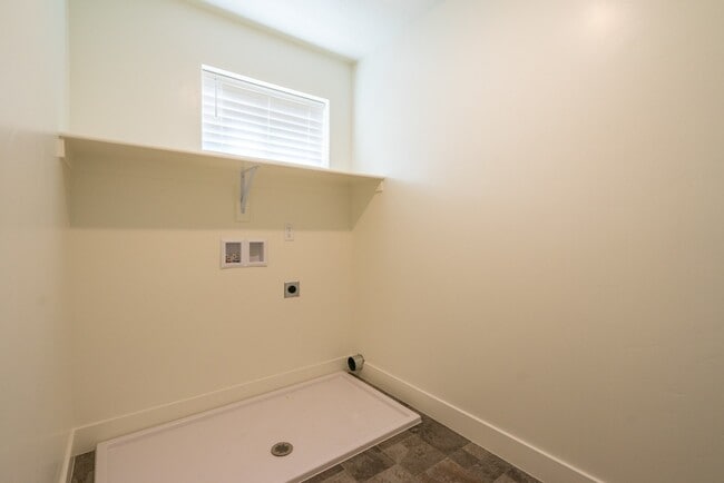 Building Photo - Modern 4-Bed Stand-Alone Home with Fenced Patio