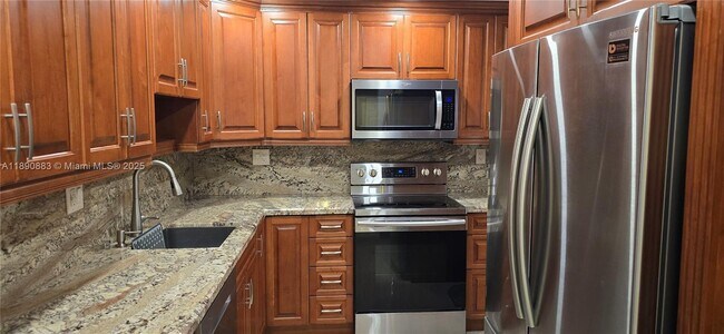 Building Photo - 10777 W Sample Rd