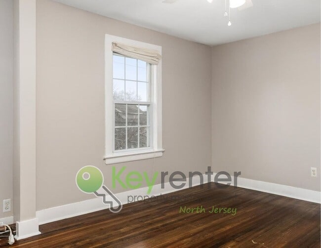 Building Photo - Spacious 3-Bed, 2-Bath Nutley Home with Bonus Office, Multi-Level Deck & Quiet Location