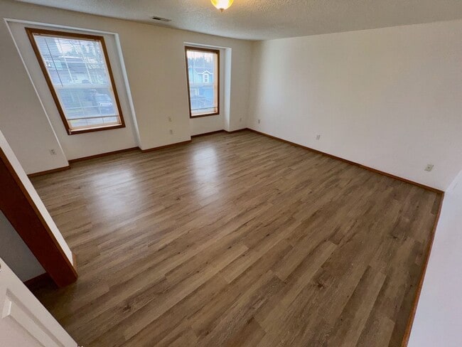 Building Photo - Spacious 4BR Home with Fenced Yard, 2-Car Garage & Convenient Location