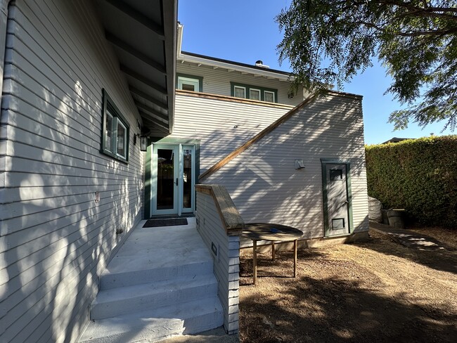 Back yard near Kitchen - Outside Staircase - 5007 Raymond Pl