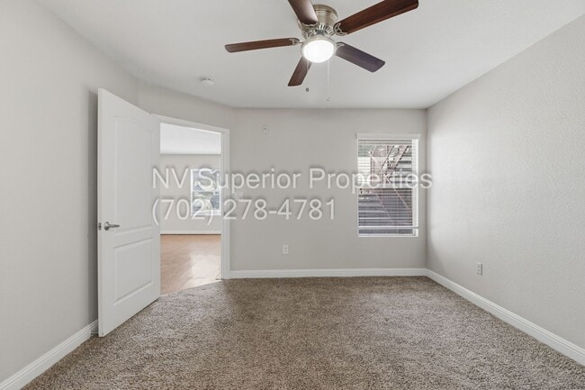 Building Photo - SW!! First floor unit with Balcony!! Gated!! Clubhouse!!  Community pool!! Spa!! Exercise Room!! ...