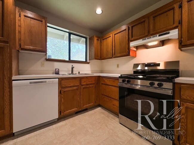 Building Photo - Your Charming Rustic Retreat- 3 Bedroom With Wrap-A-Round Yard