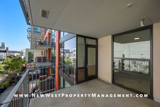 Building Photo - Modern East Village 1-Bedroom at Icon! Sma...