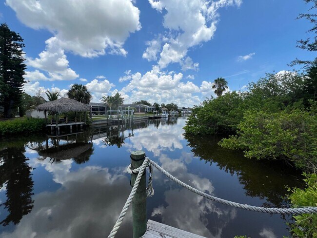 Building Photo - ANNUAL, UNFURNISHED * POOL * CANAL ** AVAIL 8/1/26 * 3 BEDS/2 BATHS * $2,095/month