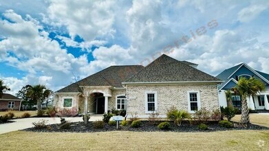 Building Photo - Stunning 4-Bedroom, 4.5-Bath Home with Pri...