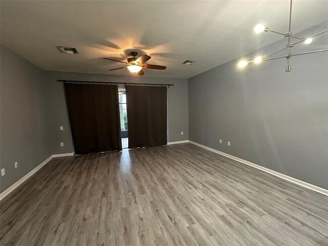 Building Photo - 10213 Pink Palmata Ct